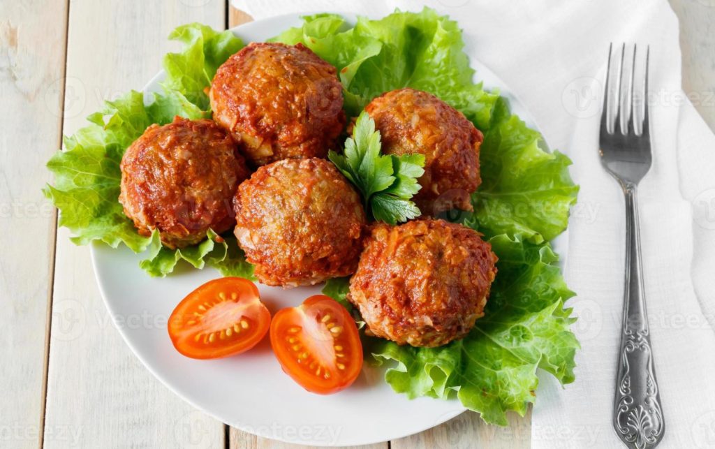 homemade-meat-balls-with-vegetables-in-tomato-sauce-photo-1024x643